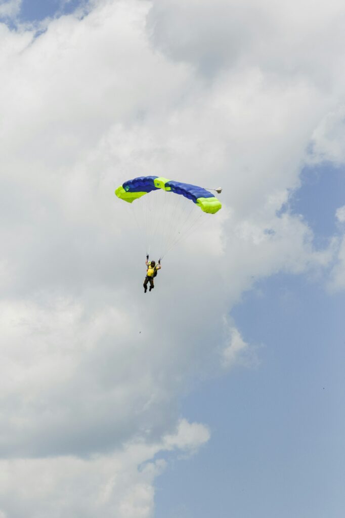 skydiver in the sky with a wing-type parachute